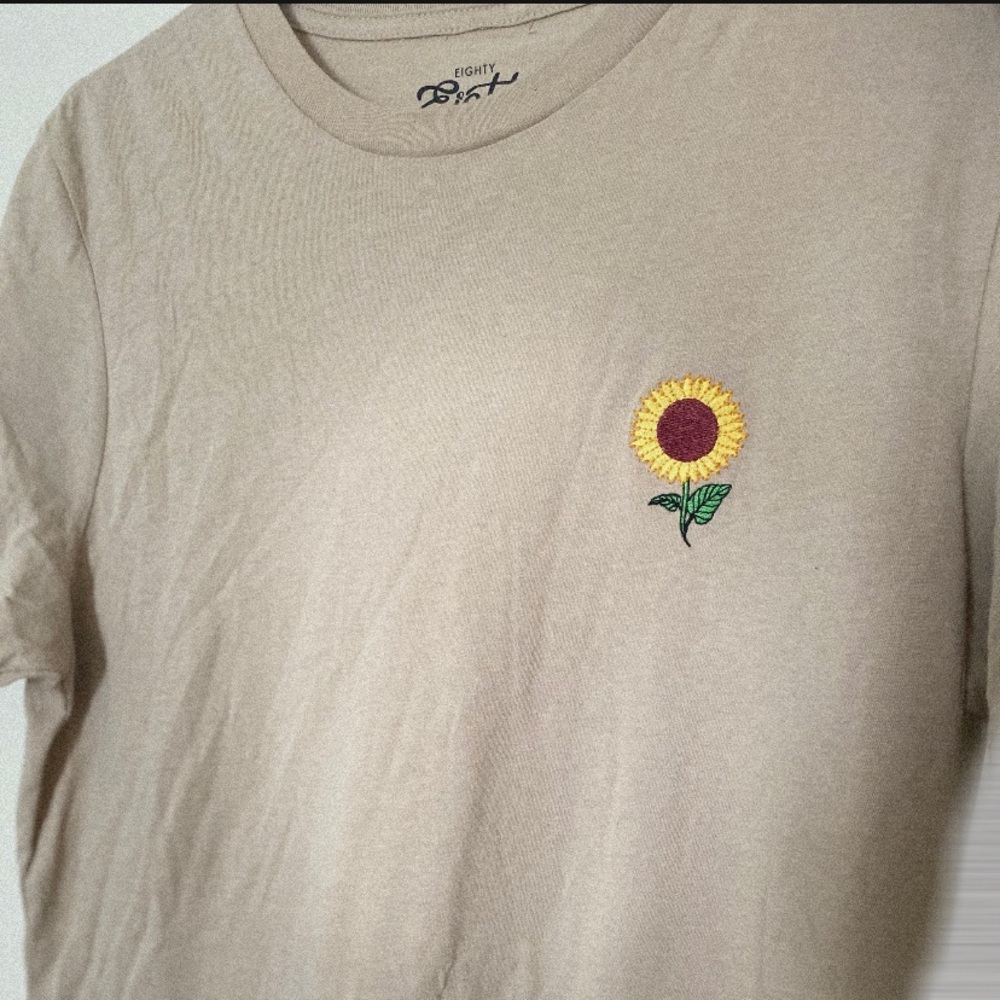 Tan shirt with sunflower design